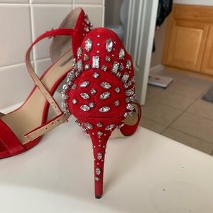 RED BCBGENERATION PUMP HEEL WITH STUDS ON BACK